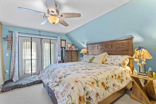 carpeted bedroom with ceiling fan, access to exterior, and vaulted ceiling