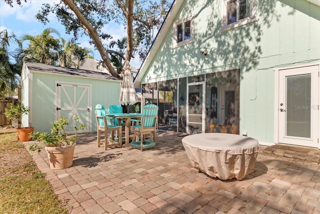 view of patio / terrace with a storage unit