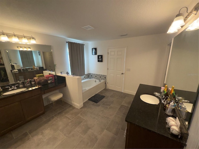 bathroom with vanity and a tub to relax in