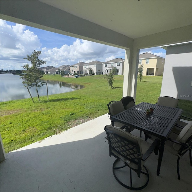 view of patio / terrace featuring a water view