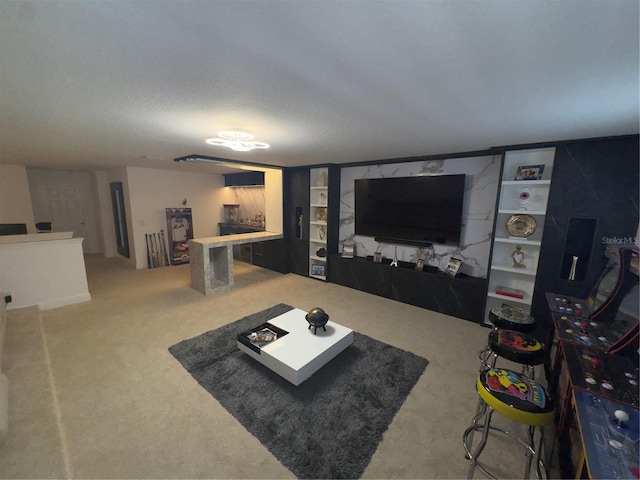 carpeted living room with a textured ceiling