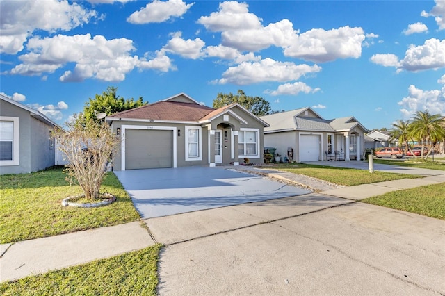 ranch-style home with a front lawn and a garage