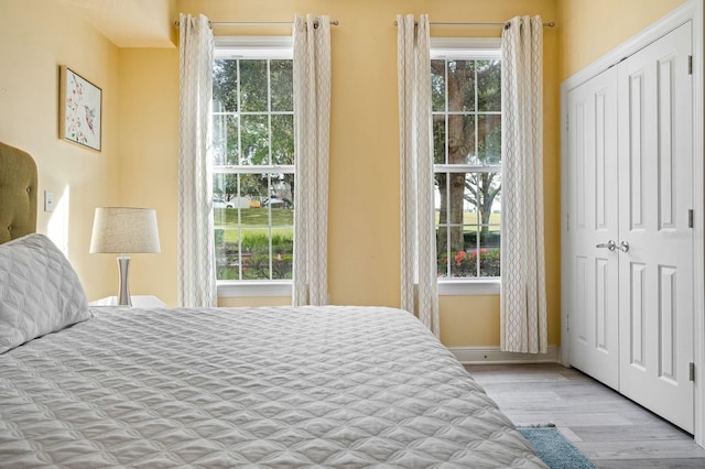 bedroom featuring light wood-type flooring