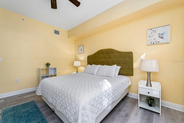 bedroom featuring ceiling fan and hardwood / wood-style floors