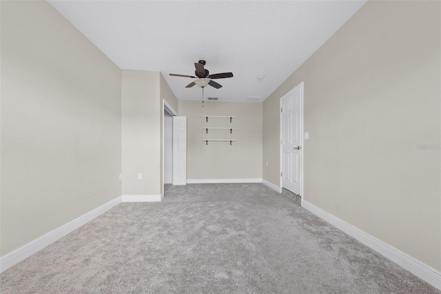 2108 Lemon St, Haines City, FL 33844 - carpeted spare room featuring ceiling fan and baseboards