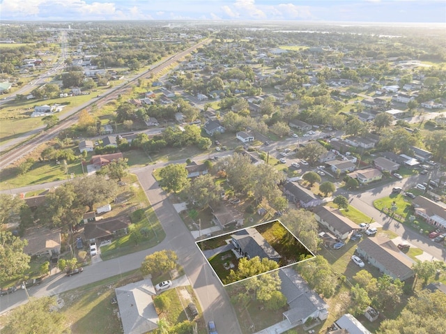 2108 Lemon St, Haines City, FL 33844 - aerial overview of property's location featuring property boundaries highlighted and nearby suburban area