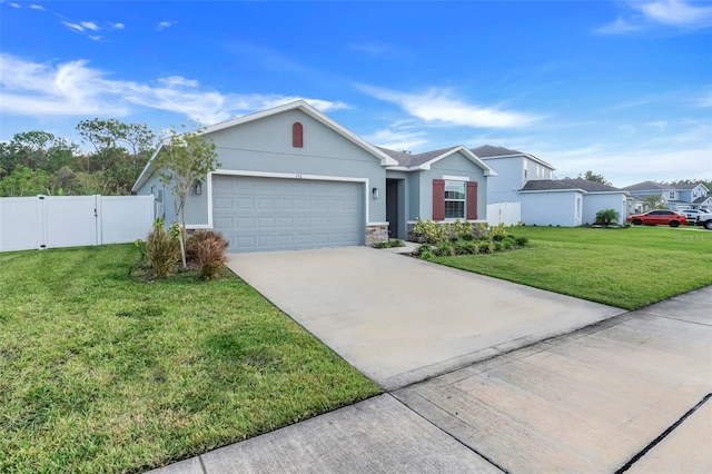 ranch-style home with a front yard and a garage