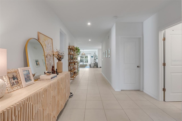 hallway with light tile patterned floors