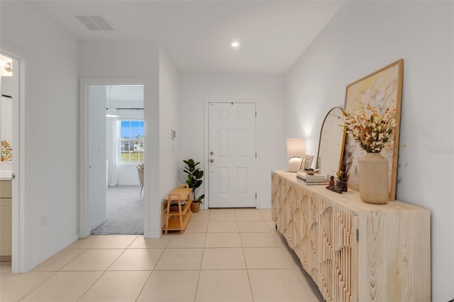 foyer with light tile patterned floors