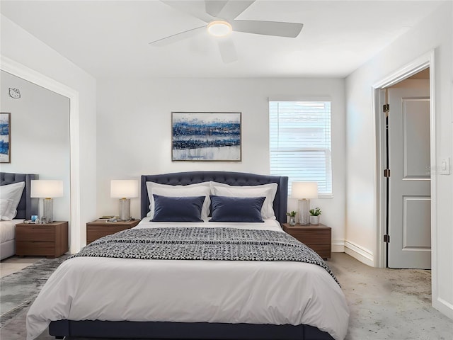 bedroom featuring baseboards and ceiling fan