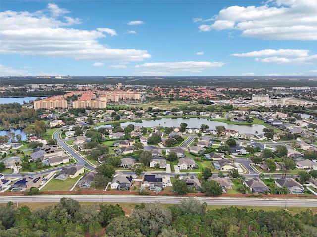 bird's eye view with a water view