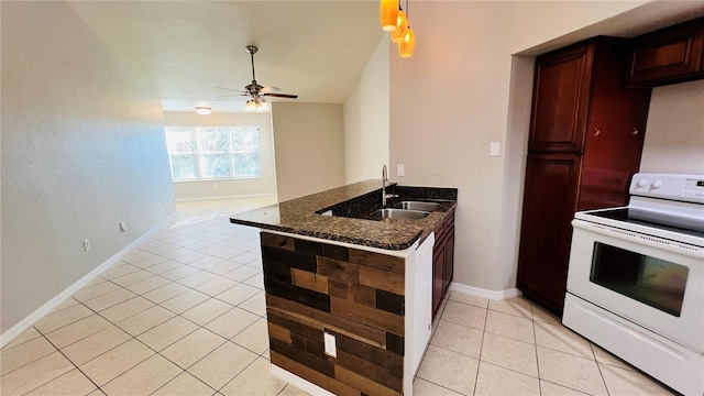 kitchen with light tile patterned flooring, kitchen peninsula, white electric stove, and sink