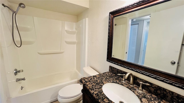 full bathroom featuring vanity, toilet, and tub / shower combination