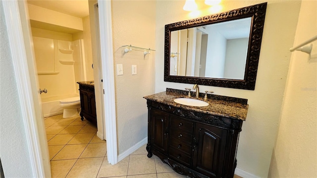 full bathroom featuring tile patterned flooring, vanity, toilet, and tub / shower combination