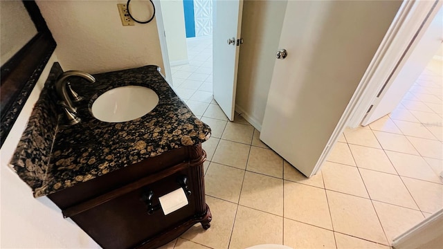 bathroom featuring tile patterned floors and vanity