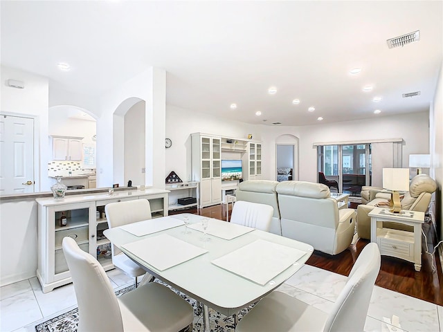 dining room with light hardwood / wood-style flooring