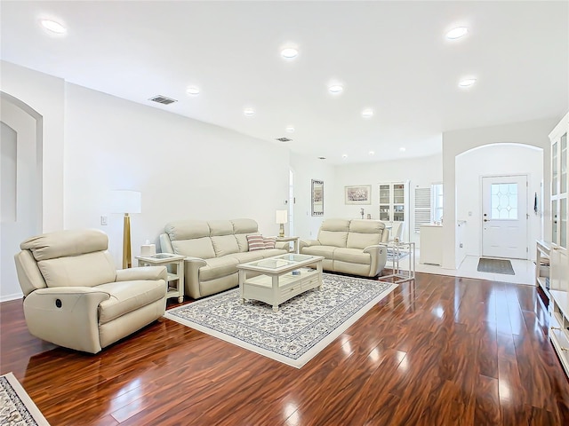 living room featuring dark hardwood / wood-style floors