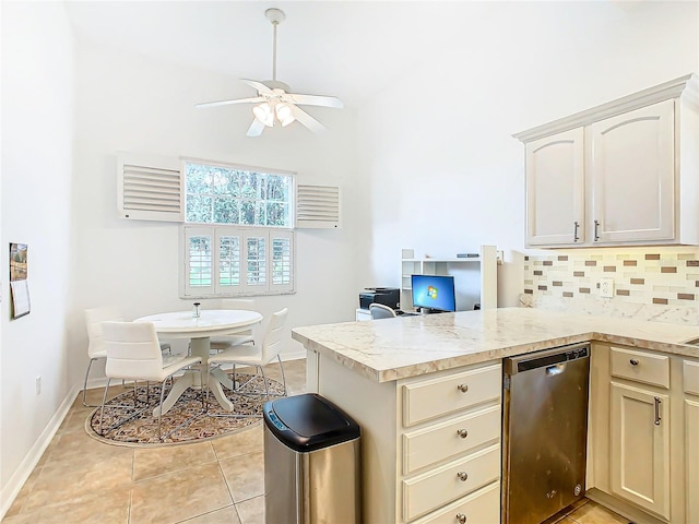 kitchen featuring dishwasher, ceiling fan, light tile patterned floors, tasteful backsplash, and kitchen peninsula