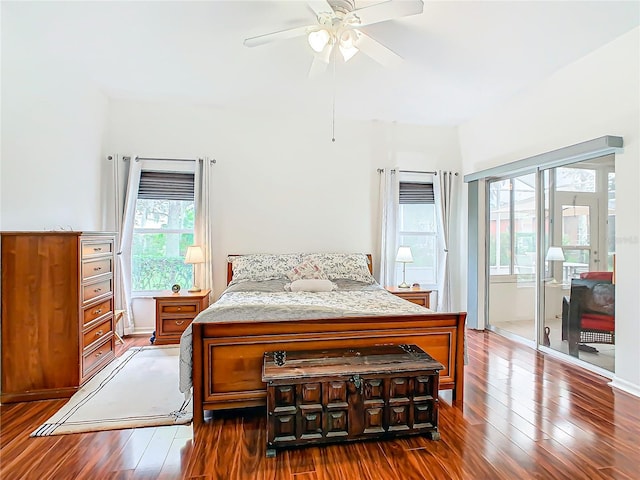 bedroom with ceiling fan and dark hardwood / wood-style flooring