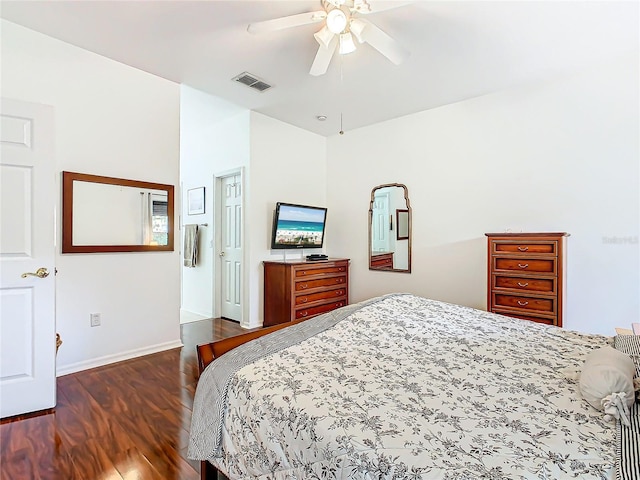 bedroom with ceiling fan and dark hardwood / wood-style flooring