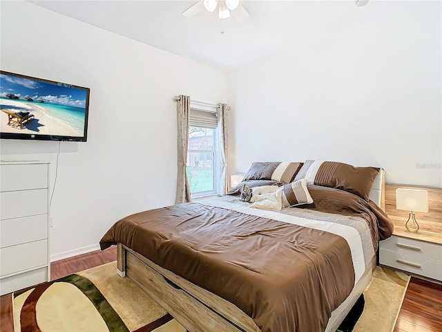 bedroom featuring ceiling fan and hardwood / wood-style floors