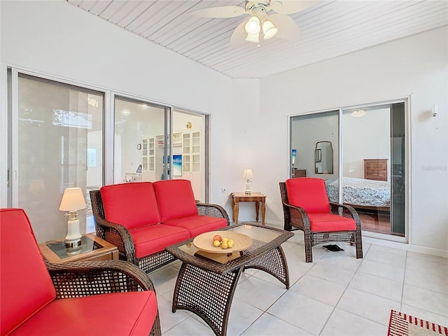 tiled living room featuring ceiling fan and wooden ceiling