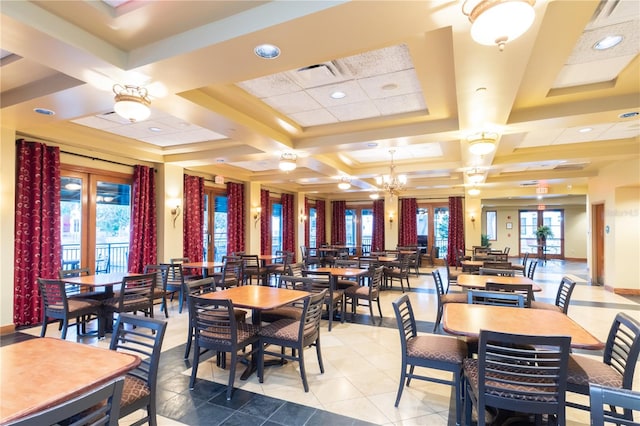 dining space featuring beamed ceiling, a chandelier, and coffered ceiling