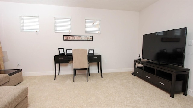 office featuring plenty of natural light and light colored carpet