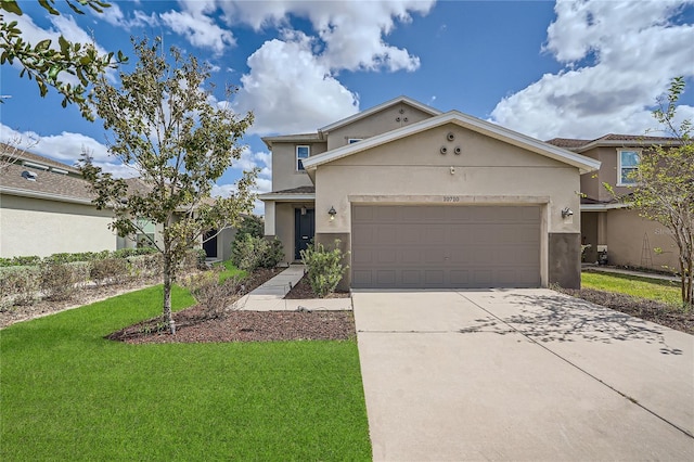 view of front of house featuring a garage and a front lawn