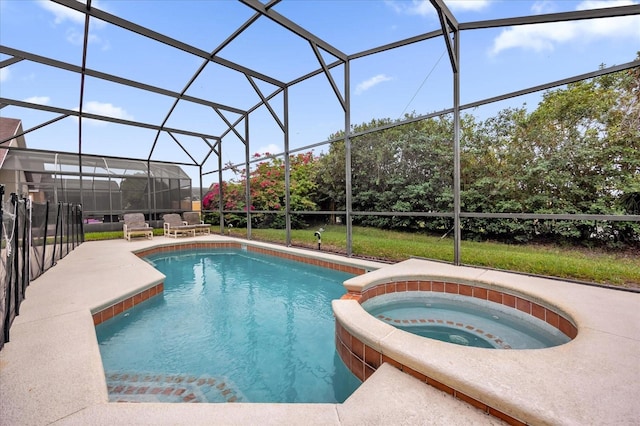 view of swimming pool featuring a lanai, an in ground hot tub, and a patio