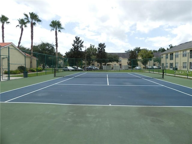 view of tennis court with basketball court