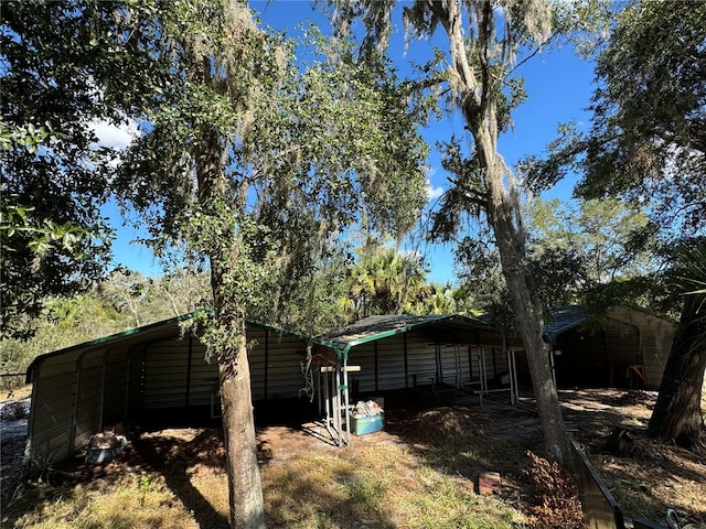 view of yard with a carport