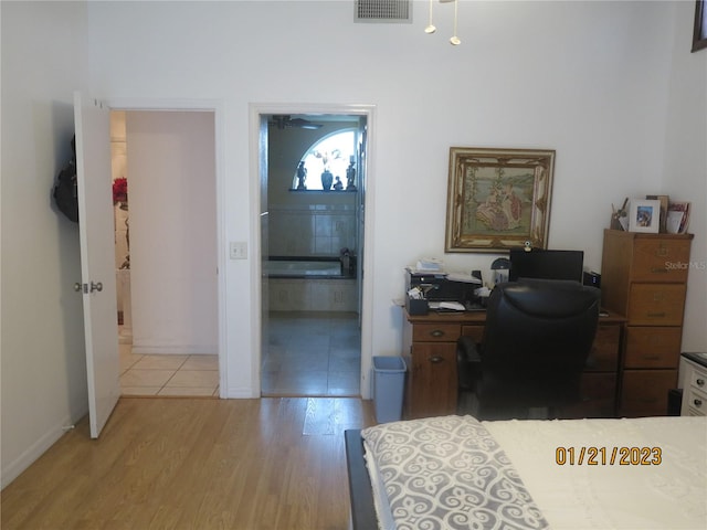 office area with light hardwood / wood-style flooring