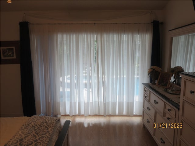 bedroom featuring light hardwood / wood-style flooring