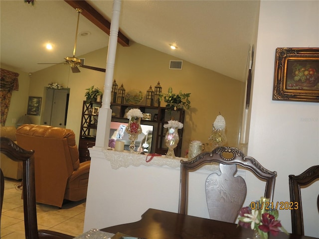 dining room featuring vaulted ceiling with beams, ceiling fan, and light tile patterned floors