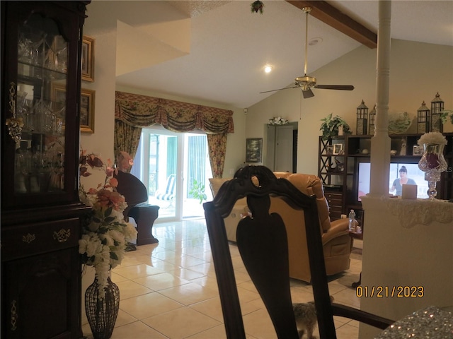 tiled living room with ornate columns, ceiling fan, and lofted ceiling with beams