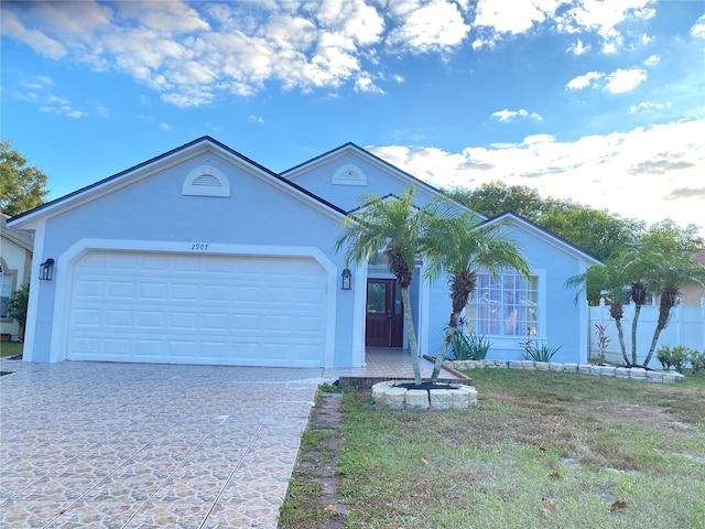 view of front of home featuring a garage