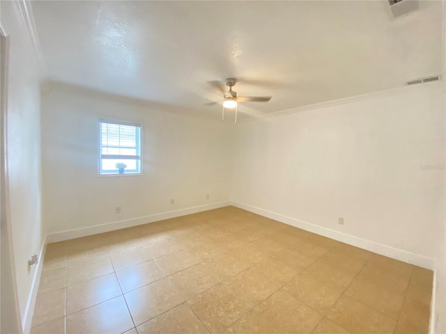 spare room with ceiling fan and ornamental molding