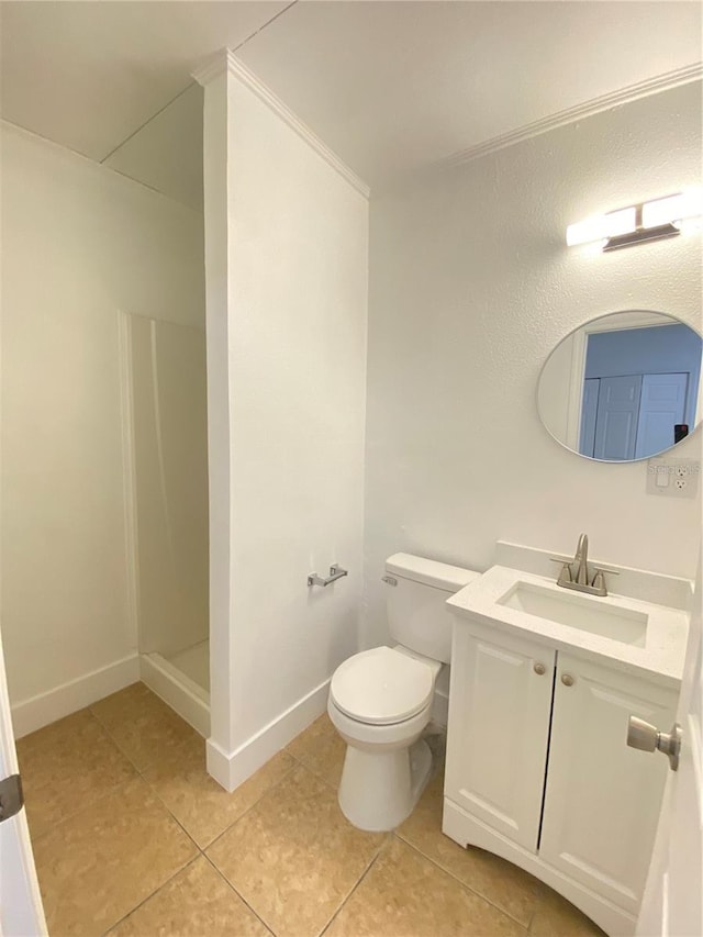 bathroom featuring tile patterned flooring, a shower, vanity, and toilet