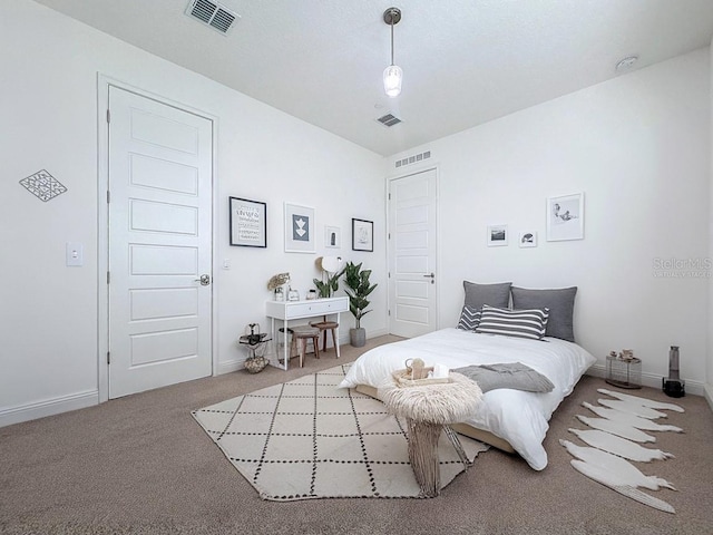 bedroom with light carpet