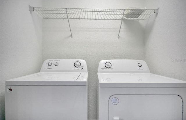 laundry area featuring separate washer and dryer