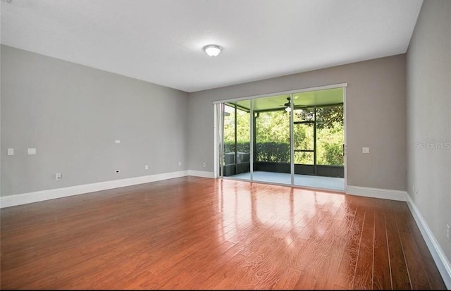 empty room featuring hardwood / wood-style floors