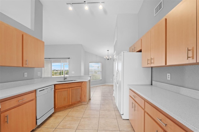 kitchen featuring sink, an inviting chandelier, high vaulted ceiling, white appliances, and light tile patterned flooring