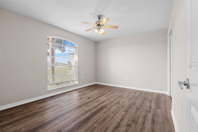 unfurnished room with hardwood / wood-style floors and ceiling fan