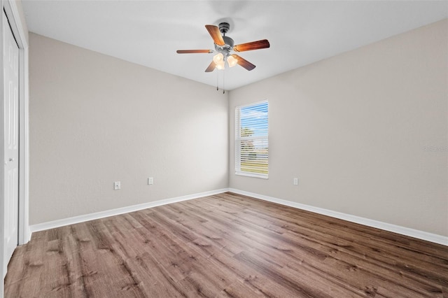 unfurnished bedroom with light wood-type flooring, a closet, and ceiling fan