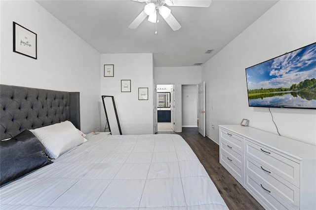 bedroom featuring dark hardwood / wood-style floors and ceiling fan