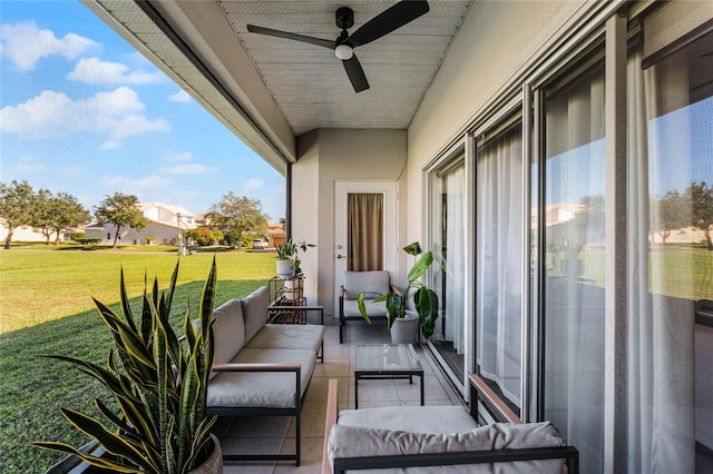 balcony featuring outdoor lounge area and ceiling fan