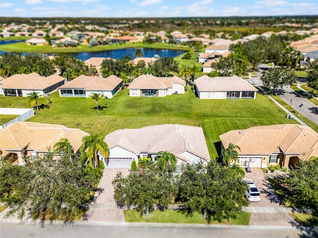 drone / aerial view featuring a water view