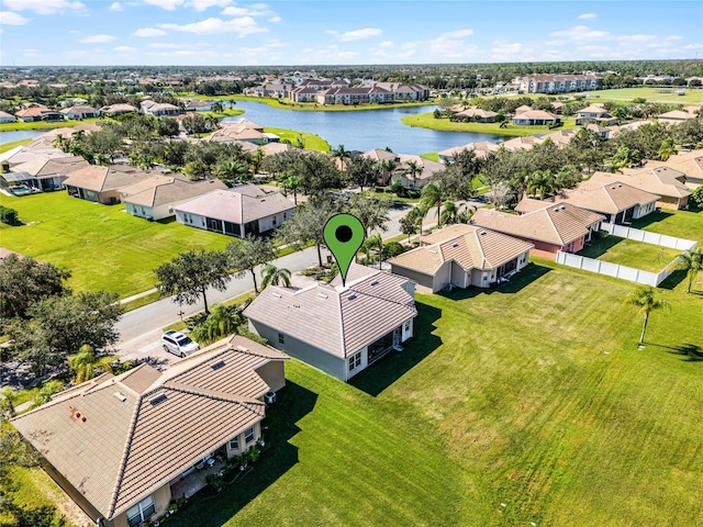 bird's eye view with a water view