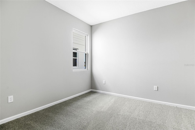 empty room featuring carpet flooring